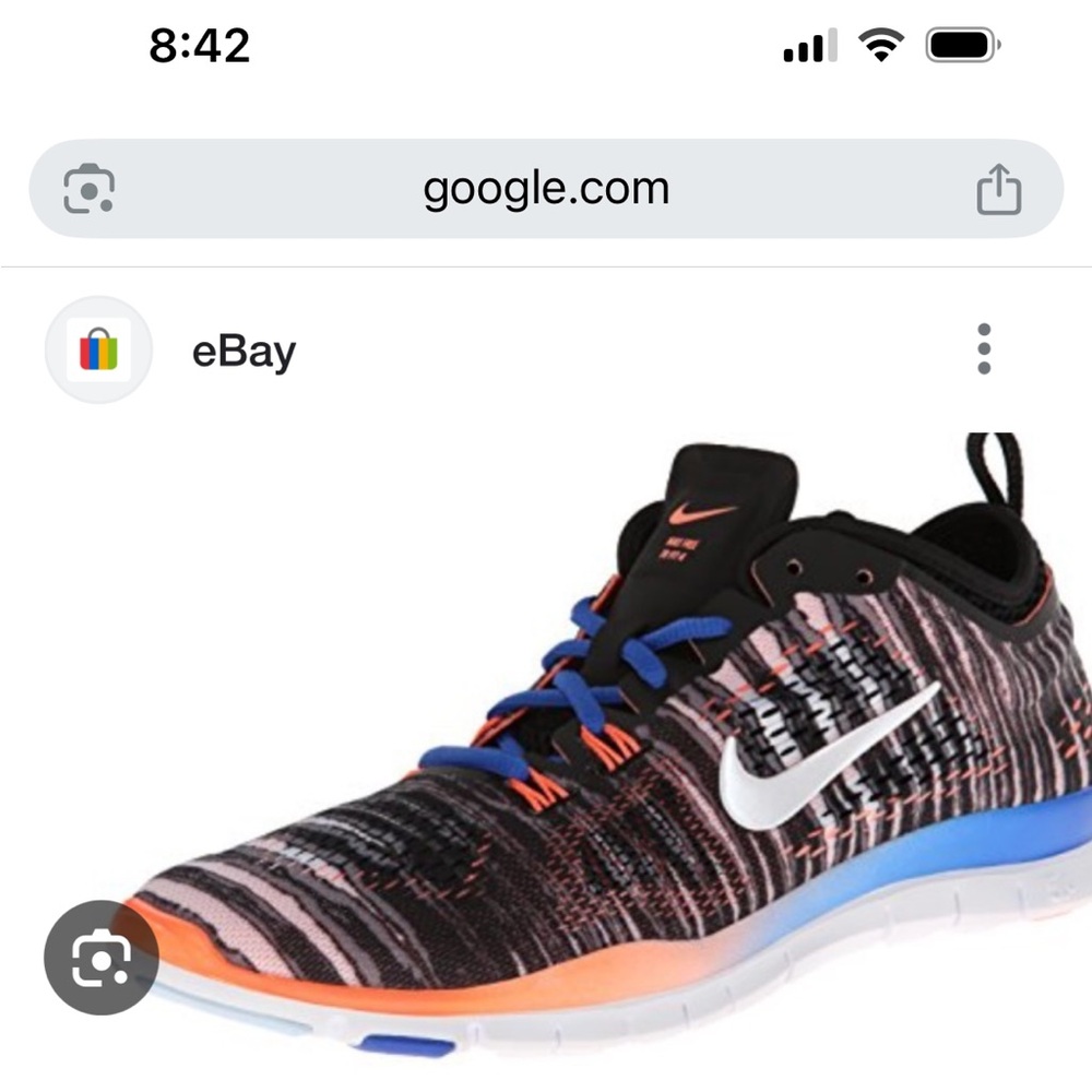 Nike Black and Orange Athletic Shoes with Dynamic Design